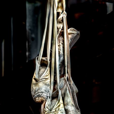 Hanging abandoned ballet toe shoes at derelict Carrie Blast Furnace in Rankin, Pennsylvania.