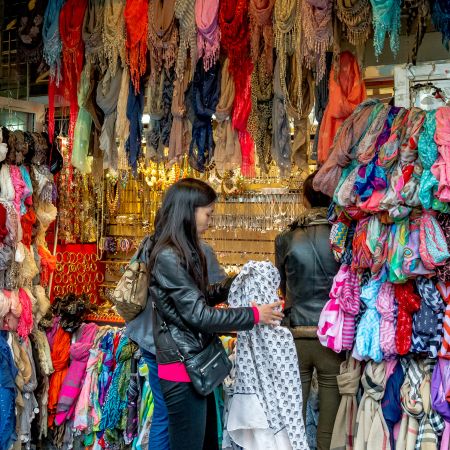 Silk scarf vendor in Chinatown, New York.