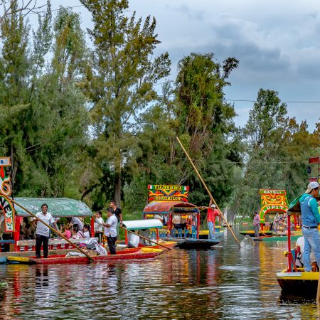 Parties on Trajinera's on Mexico City's Xochimilco canals.