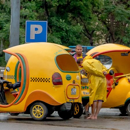 Yellow Cuban taxi cabs in Havana.