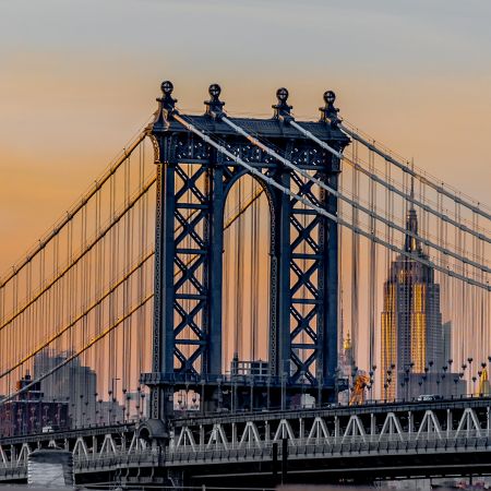 Sunset landscape of Manhattan Bridge and Empire State Building, New York.