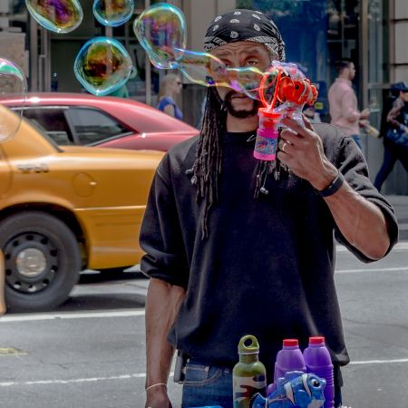 Street bubble machine vendor in New York City.