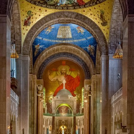 Main church nave with Catholic mosaics and domes at the Basilica of the National Shrine of the Immaculate Conception in Washington D.C.