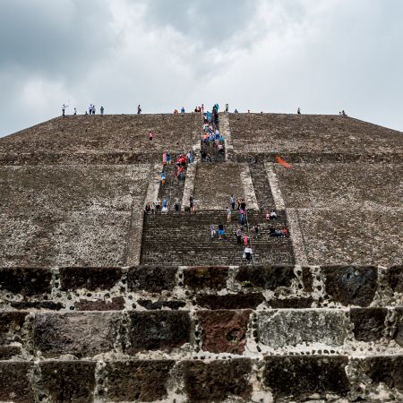 People climbing steps of Teotihuacan Pyramid.