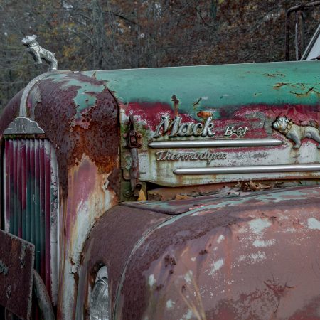 1940s rusted and peeling Mack Thermodyne truck with standing bulldog.