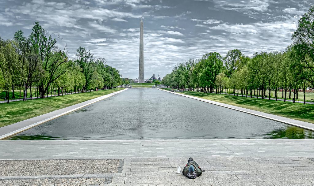 The Washington Monument and Reflecting Pool during COVID-19 and what seems like the last man on the planet.