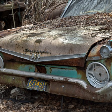 1950s turquoise and rust Ford Fairlane Skyliner.