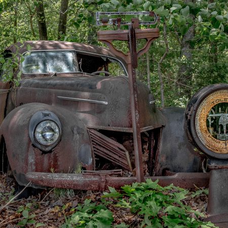 1940 Mercury Eight Coupe car with vintage Toledo scale.