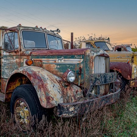 Vintage row of 1950s Mack trucks