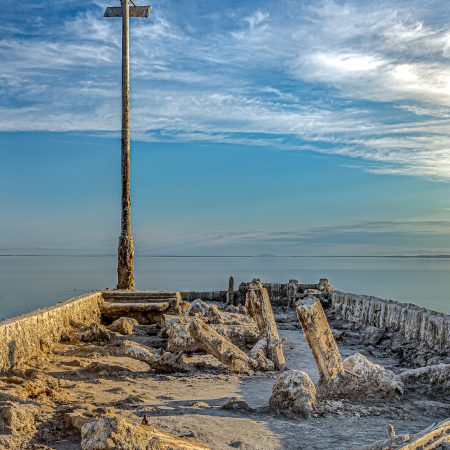 Late afternoon on salt crusted abandoned pier at Bombay Beach, Salton Sea, California.