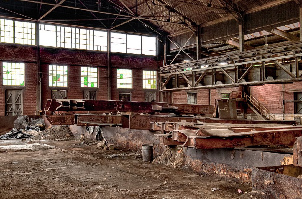 500 tons of rusty Lukens Steel supports that once were part of the World Trade Center towers rest on the dusty and rocky floor of the abandoned Lukens Steel Rolling Mill in Coatesville Pennsylvania.